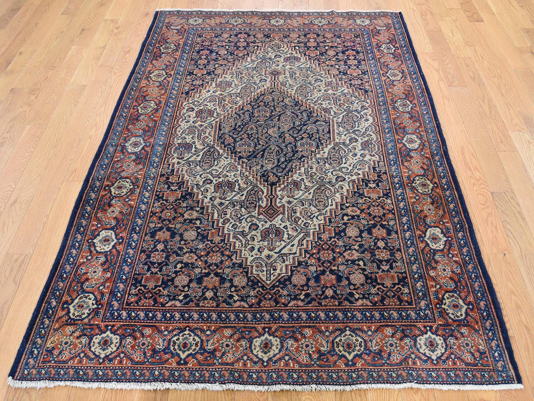 This is a genuine hand knotted oriental rug. It is not hand tufted or machine made rug. Our entire inventory is made of either hand knotted or handwoven rugs.

Revive your home style with this beautiful hand knotted Blue Antique,is an original