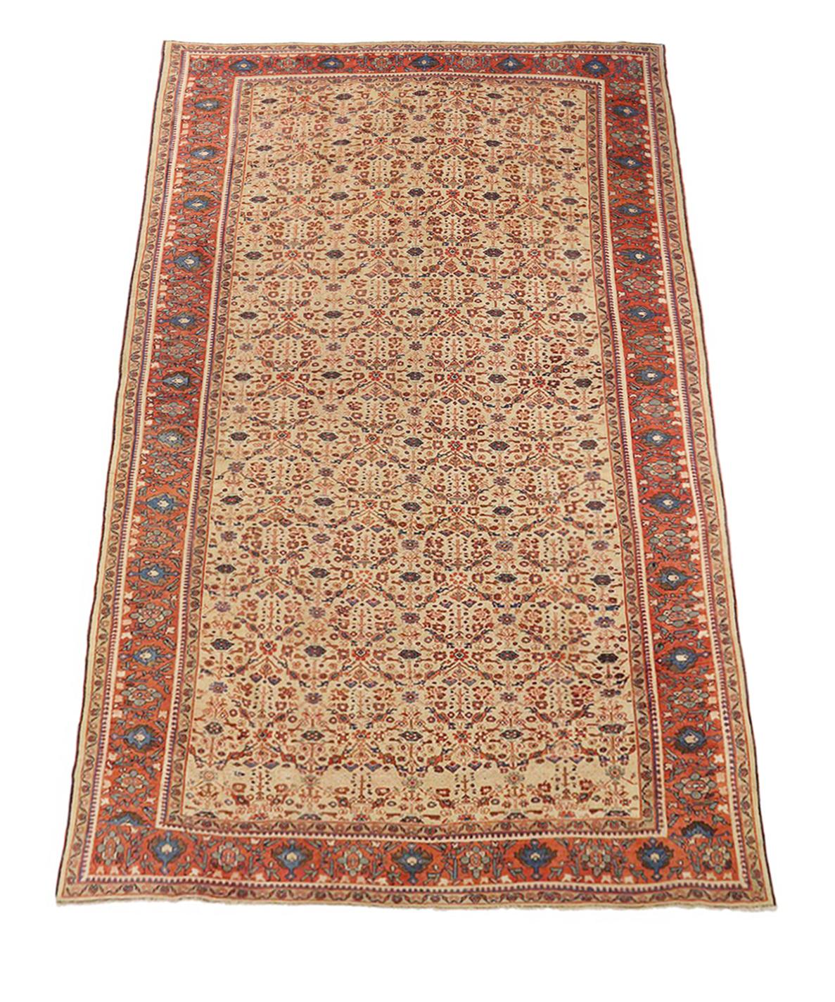 Antique handmade Persian area rug from high-quality sheep’s wool and colored with eco-friendly vegetable dyes that are proven safe for humans and pets alike. It’s a classic Sultanabad design showcasing a regal ivory field with prominent Herati