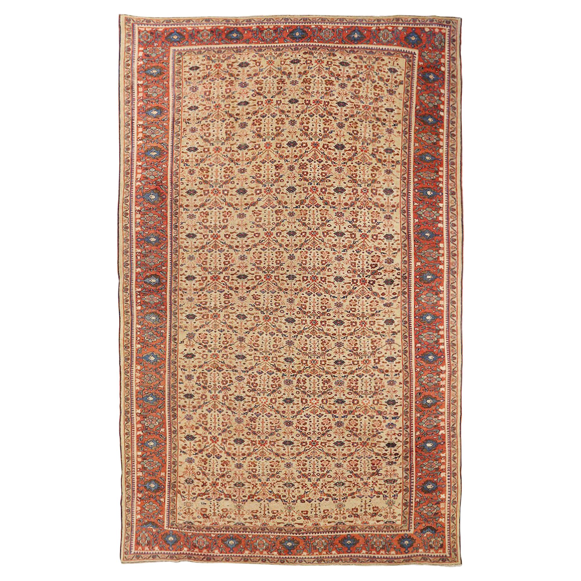 1910 Antique Persian Sultanabad Rug with Navy & Red Floral Motif on Ivory Field