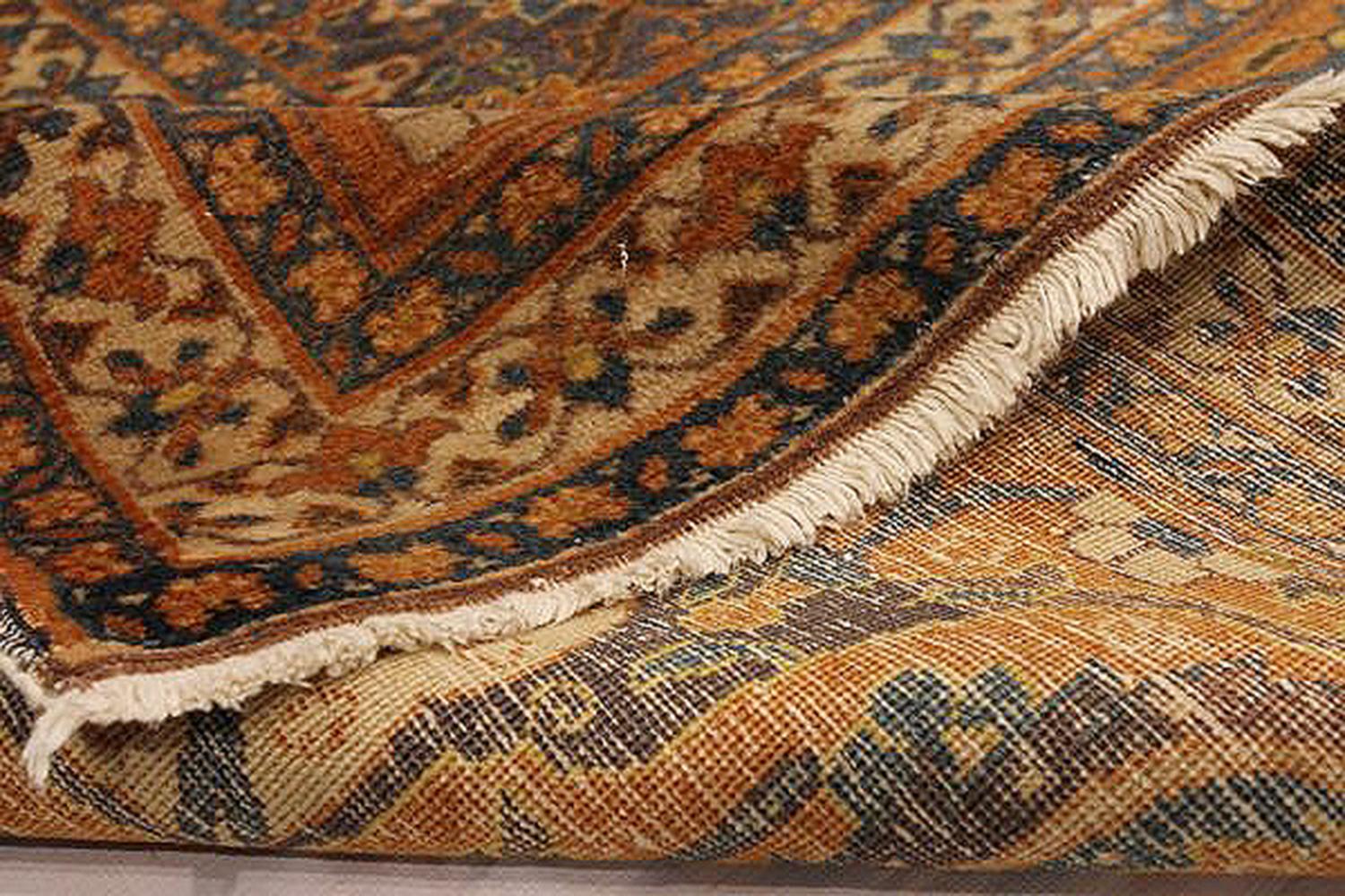 Islamic 1910 Antique Persian Tabriz Rug with Beige & Rust Flower Details on Brown Field For Sale
