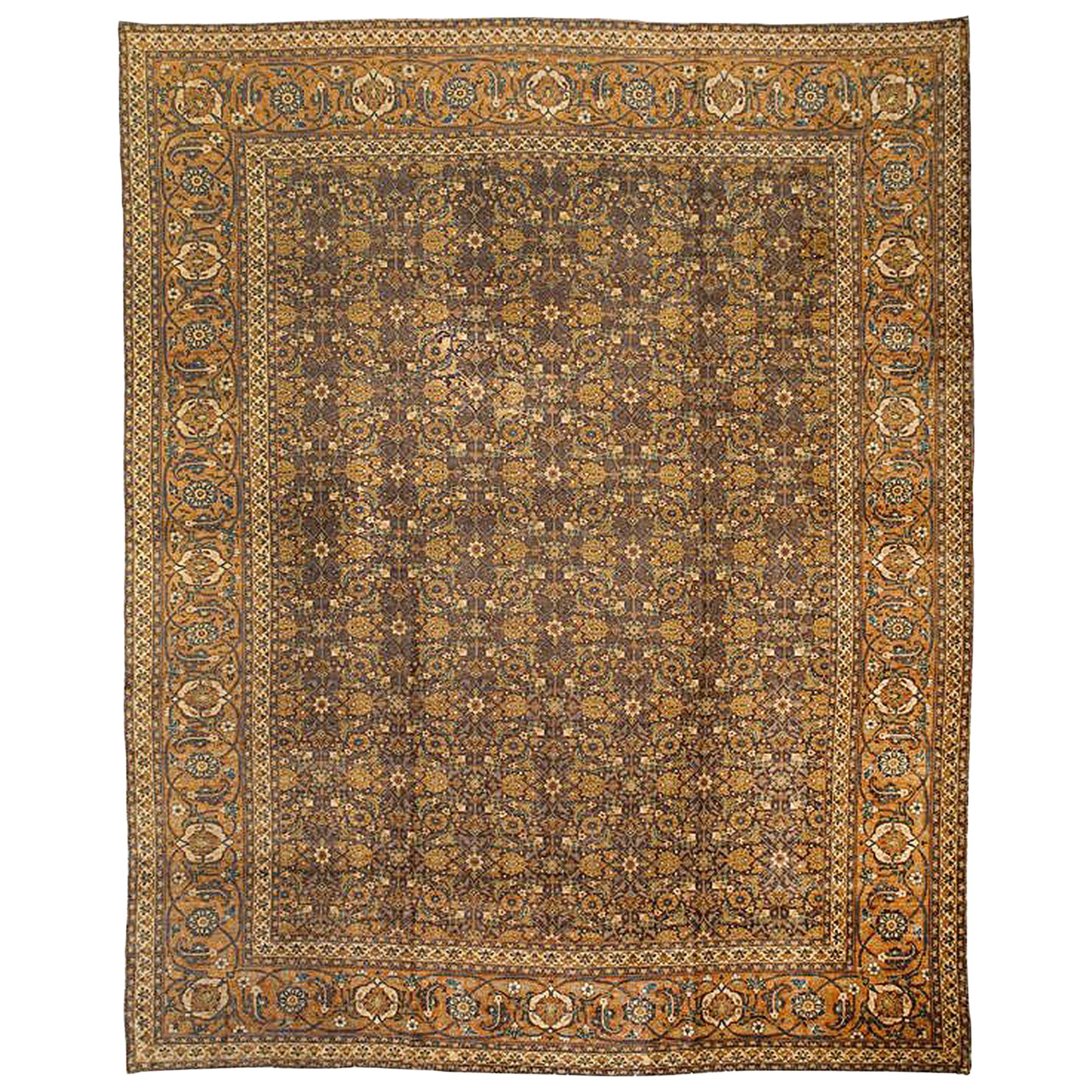 1910 Antique Persian Tabriz Rug with Beige & Rust Flower Details on Brown Field For Sale