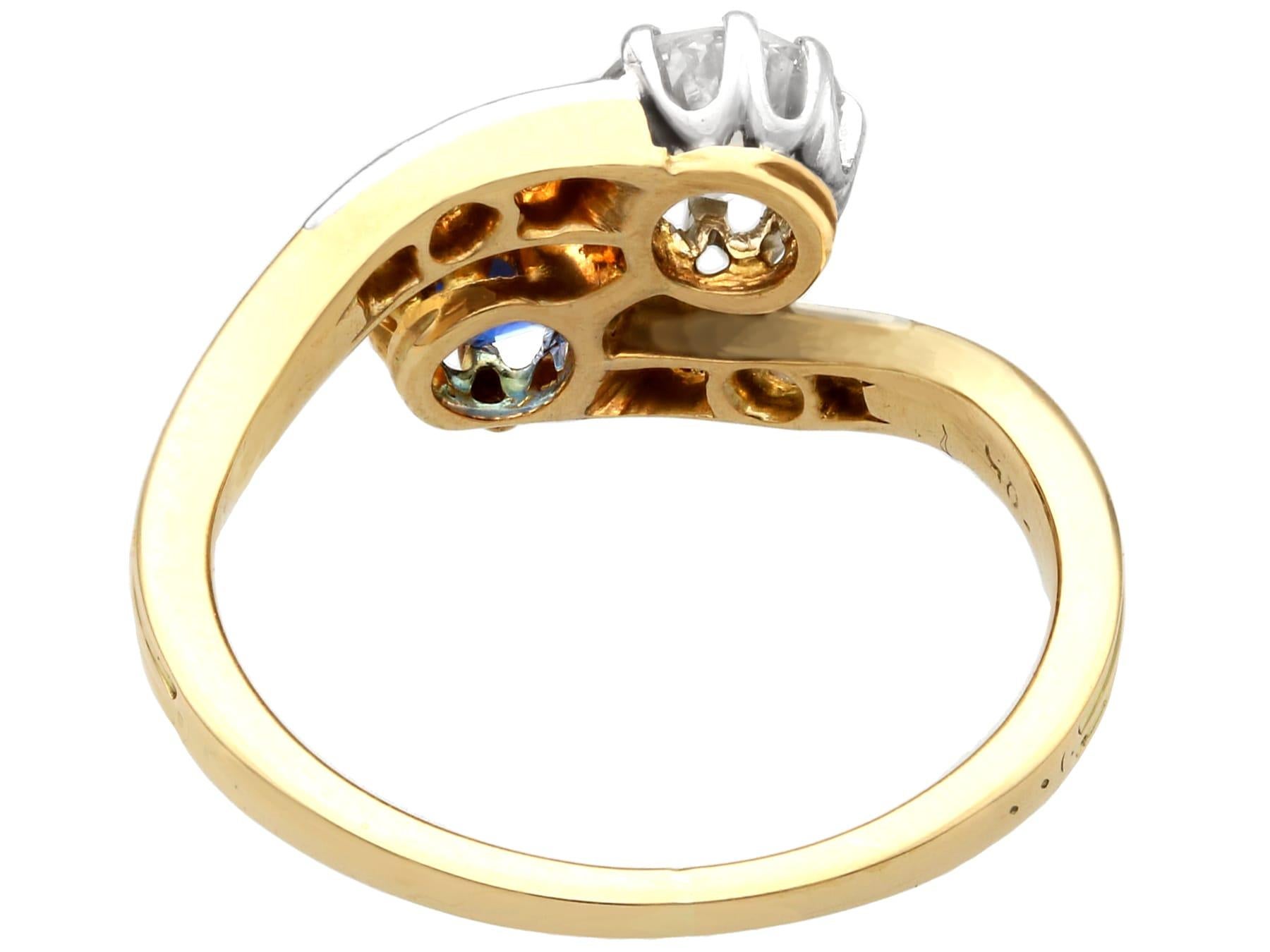 Round Cut Antique Sapphire and Diamond Yellow Gold Twist Ring For Sale