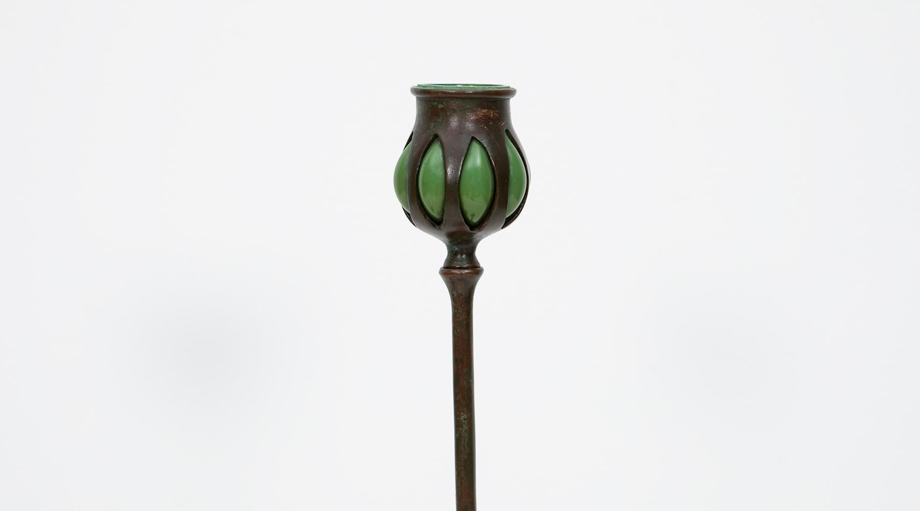 Tiffany Studios New York, Candlesticks, Bronze, USA, 1910.

A handsome pair of American patinated bronze candlesticks, elegant through their height on a one legged stick. American Art Deco, Art Nouveau. The holder for the candle itself is made of