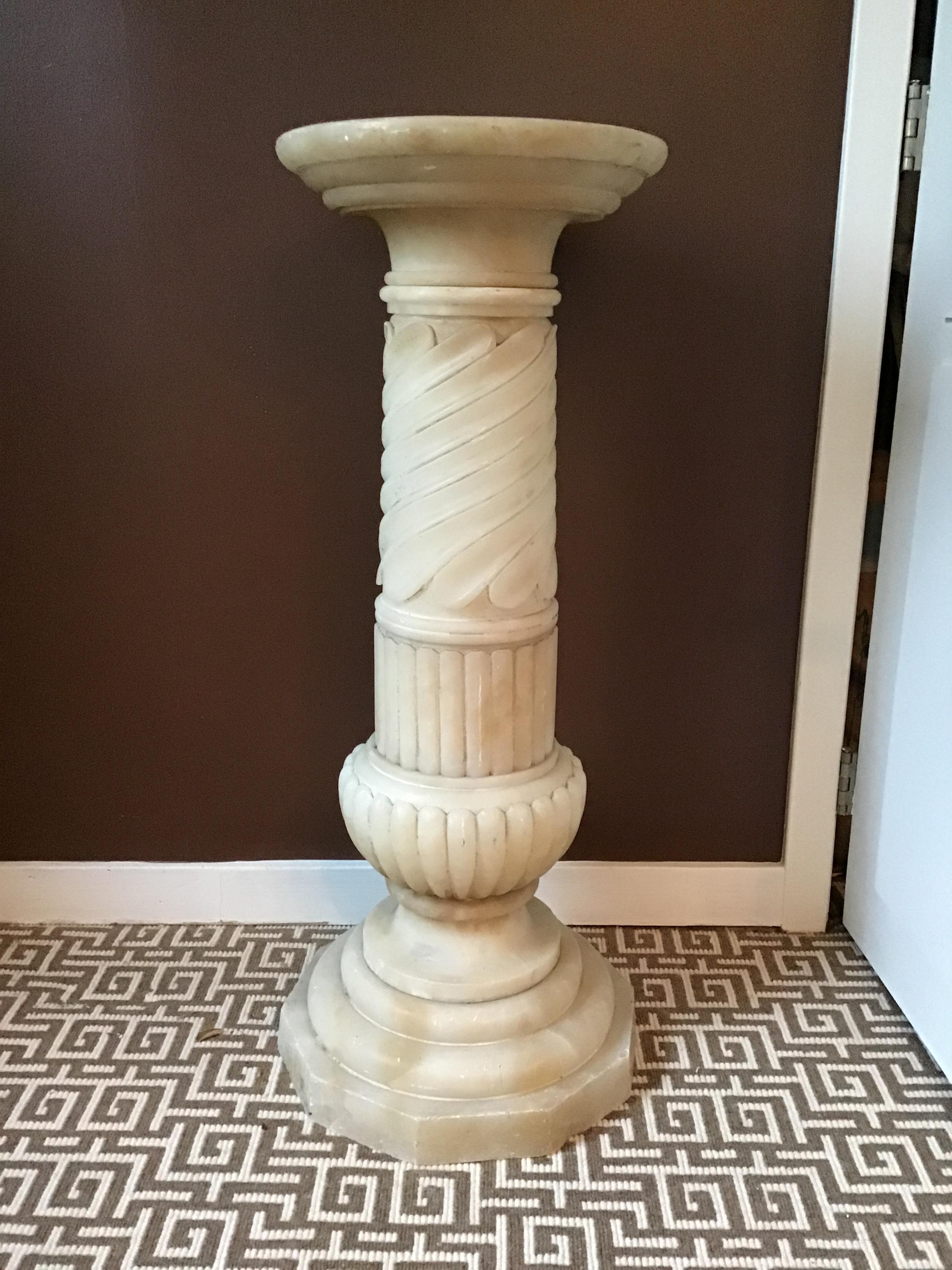 1910 carved Italian alabaster pedestal. Chunky form. Out of a Greenwich, Connecticut mansion.