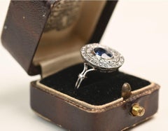 Edwardian Sapphire and Diamond Ring. GIA 1.30ct Cushion Sapphire Halo Platinum