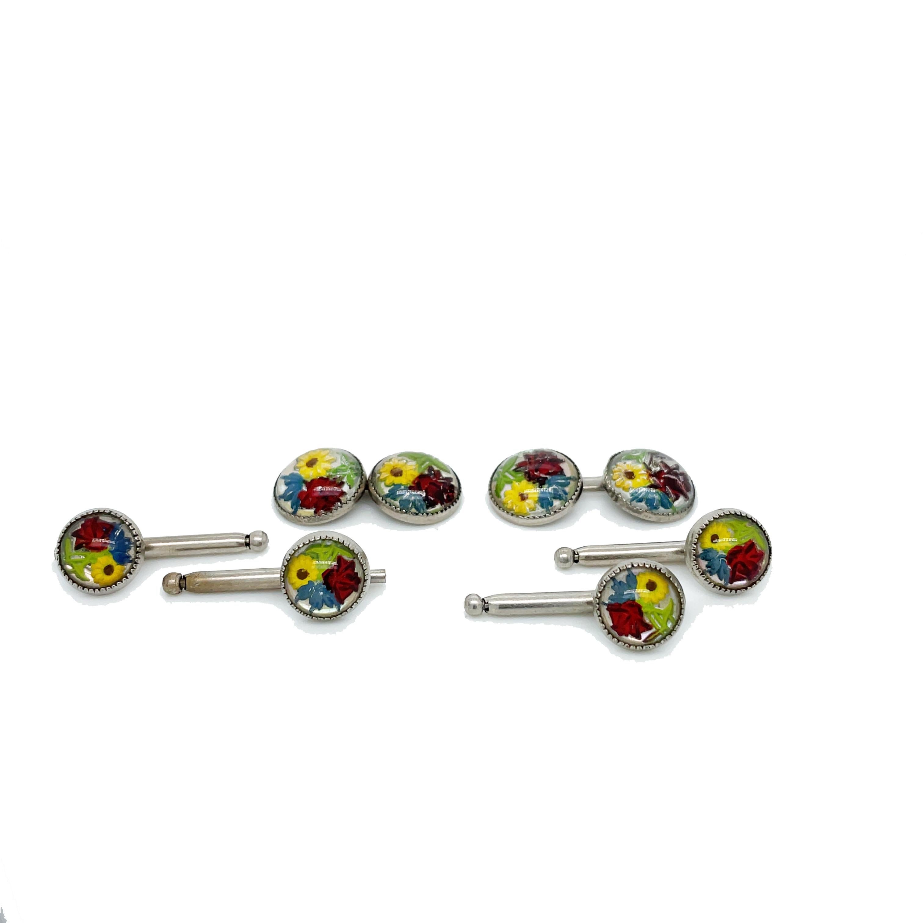 This is a stellar Edwardian 8-piece stud set that features a vibrant, unique, and fun pressed glass floral design! This spectacular set from the Edwardian era is crafted in genuine sterling silver. The face of each stud and cufflink is adorned with