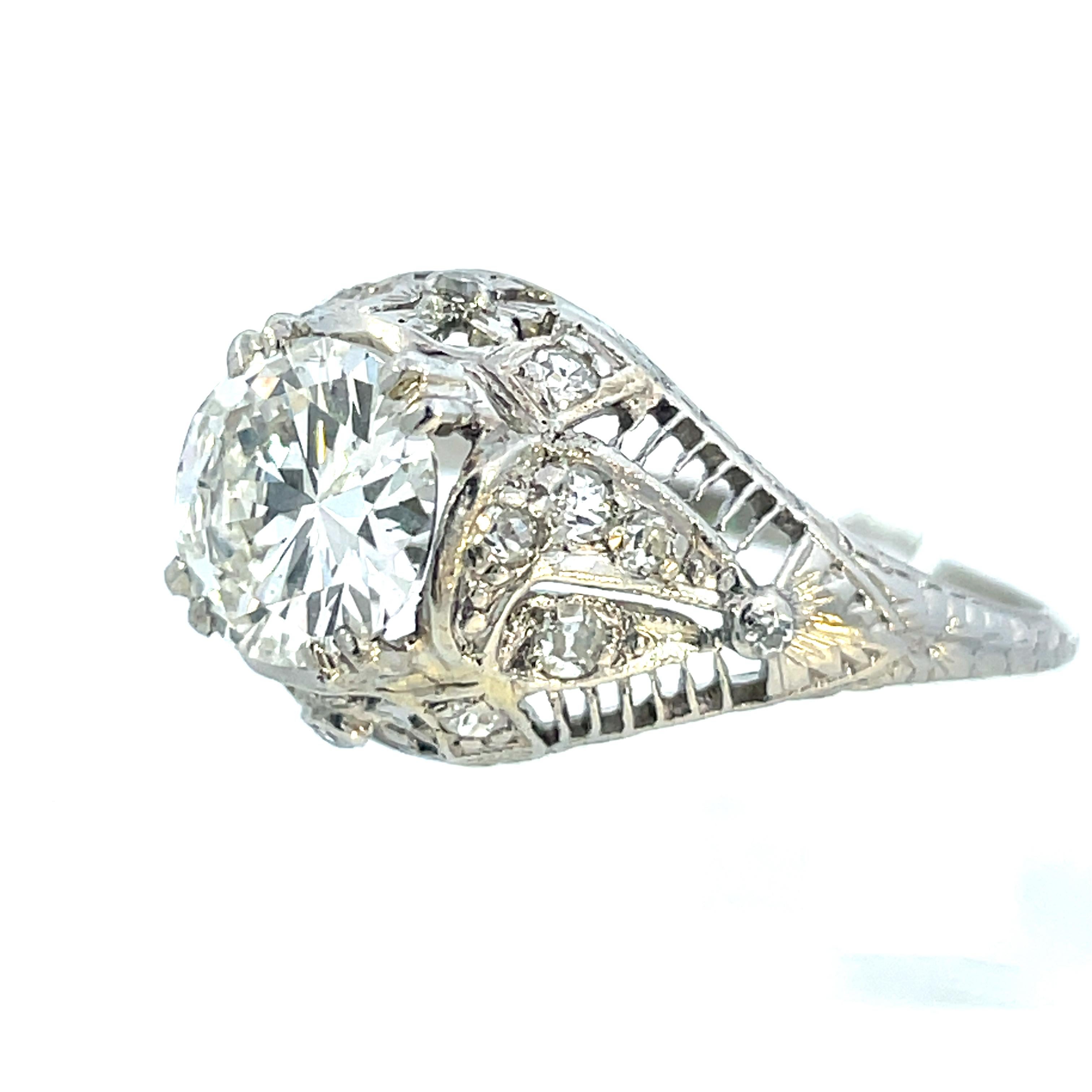 Round Cut 1910 Edwardian Platinum Filigree Ring with Round and European Cut Diamonds  For Sale