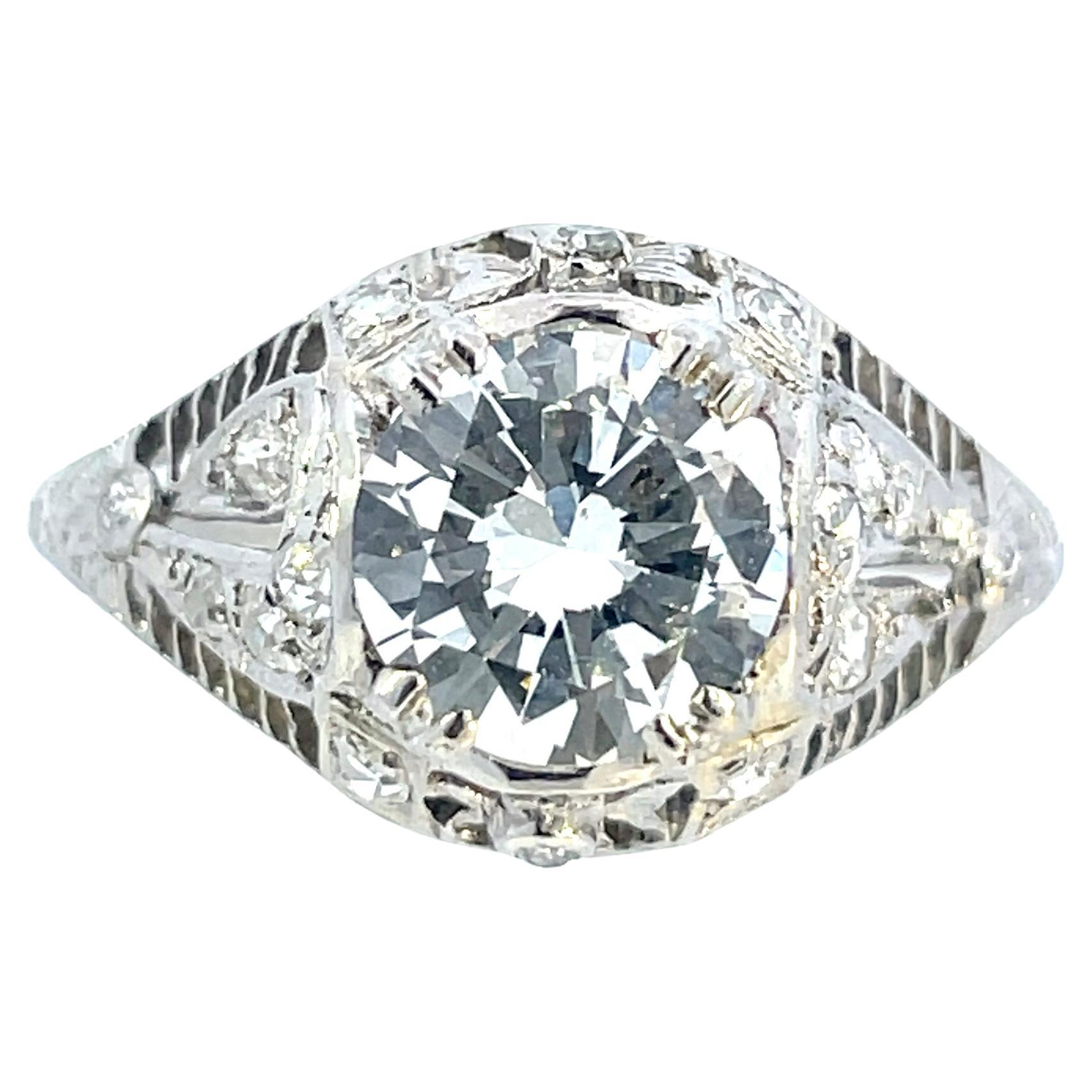1910 Edwardian Platinum Filigree Ring with Round and European Cut Diamonds 