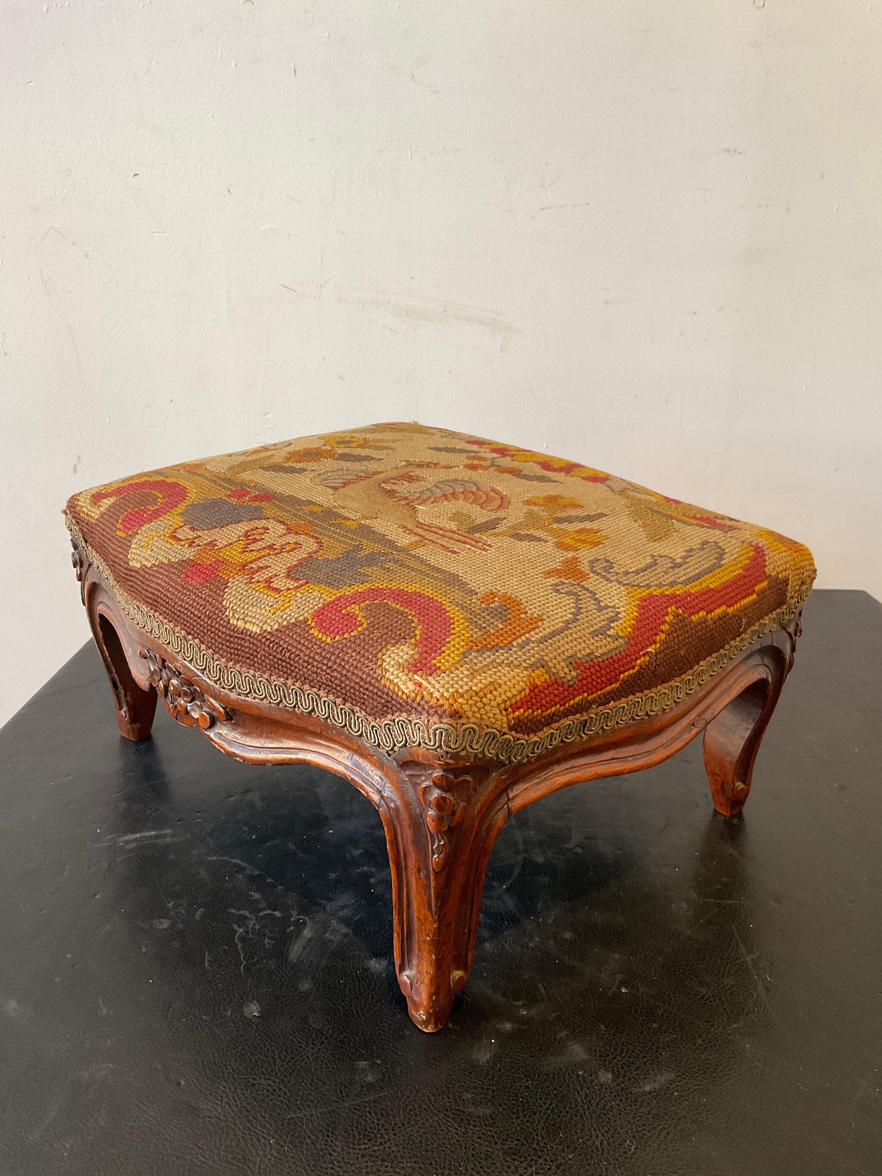 1910 French Hand Carved Wood Footstool with Needlepoint Top For Sale 1