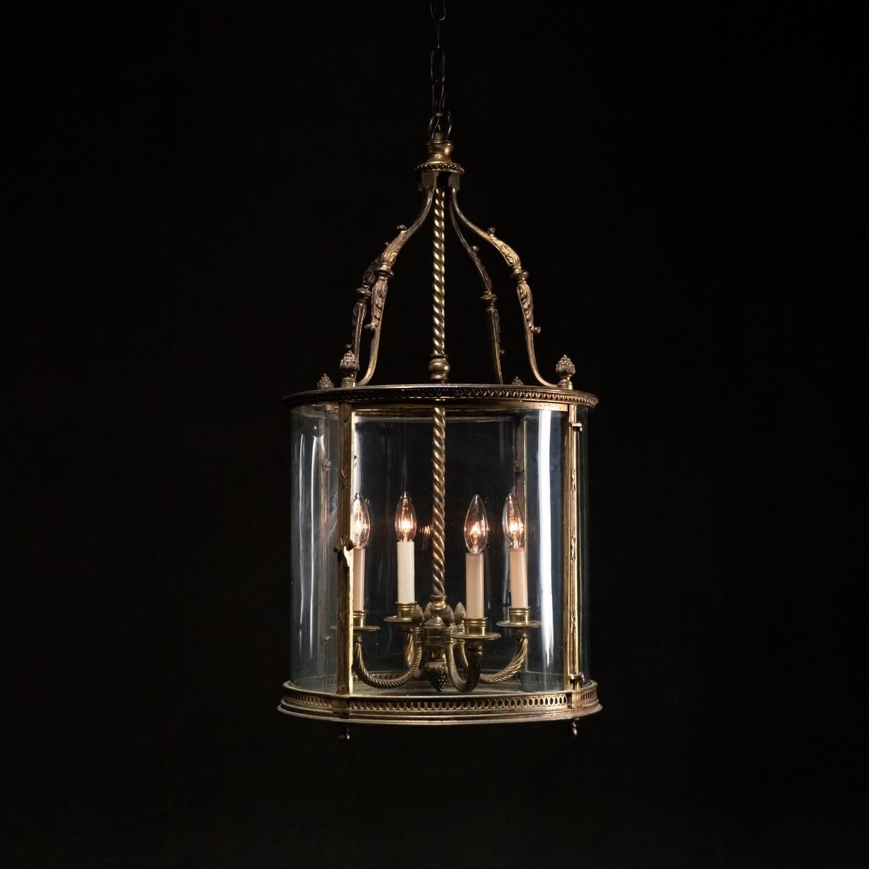  A very good quality cast bronze french lantern pendant light  with gilt surface  excellent latches for door swing ,  detailed acorns  and  fluted accents.  this is a real good example and currently sites with 3 feet of original chain.

Found in