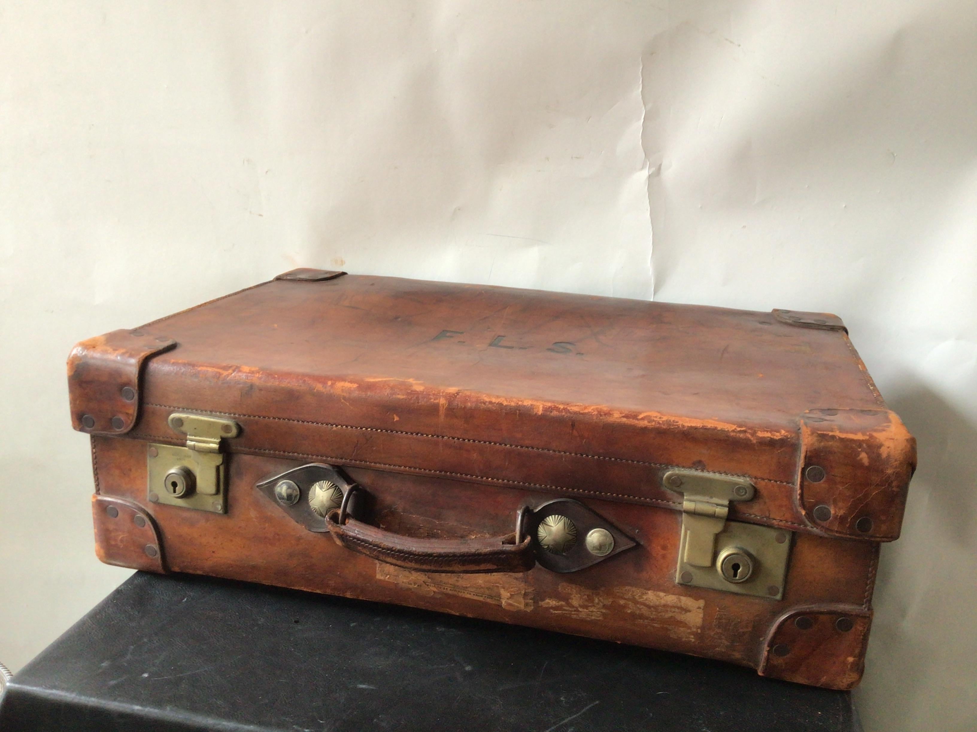 1910 English leather suitcase by Walker and Hall.