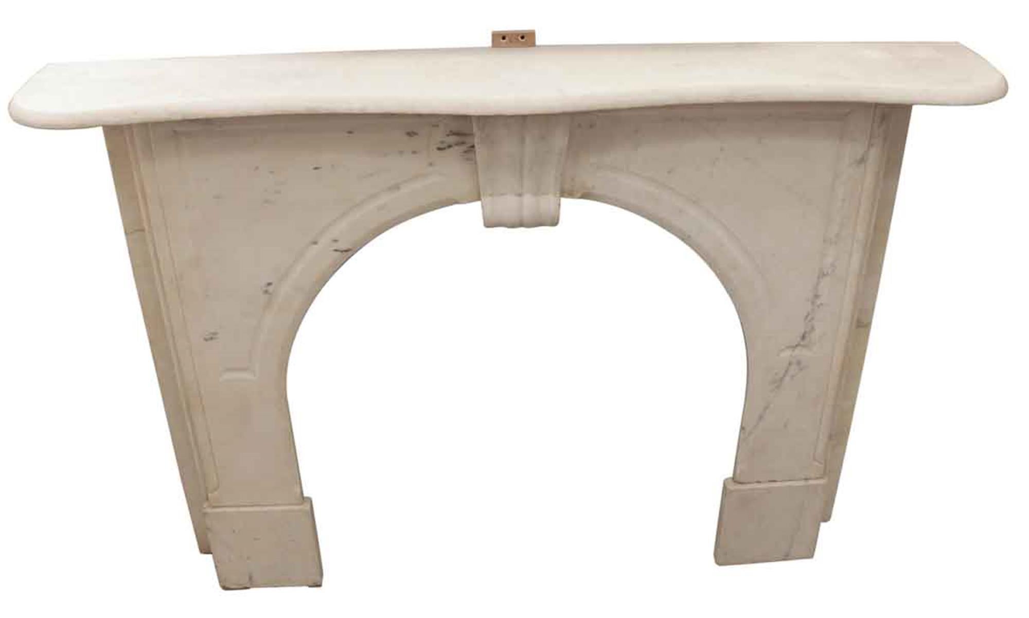 Classic white carved marble mantel with slight gray veining from a New York Brownstone, circa 1910. This can be seen at our 2420 Broadway location on the upper west side in Manhattan.