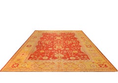 Tapis Oushak rouge et jaune de 1910
