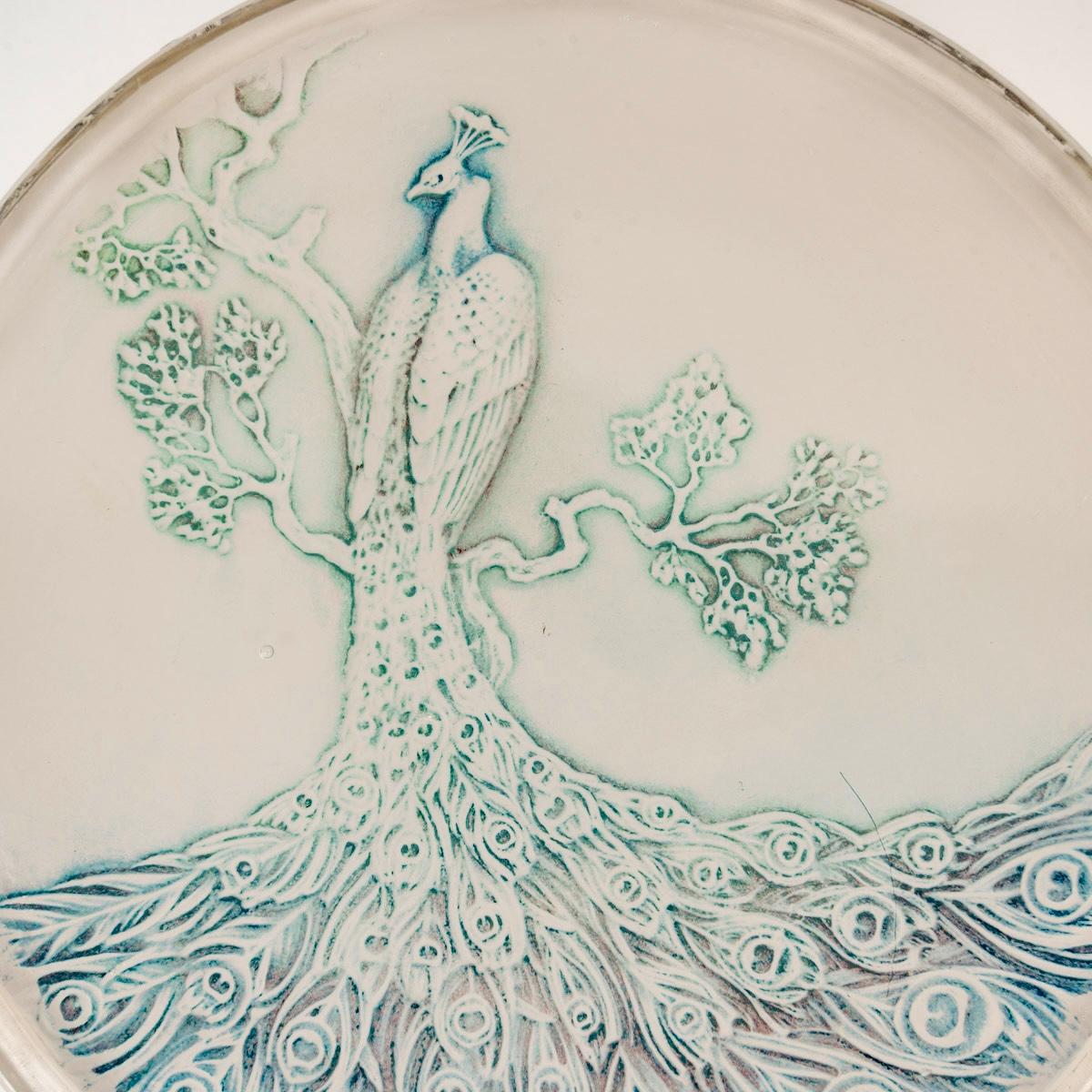 1910 René Lalique - Caja Paon Pavo real Vidrio con pátina azul Moldeado en venta