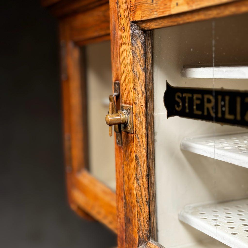 Brass 1910 tiger oak apothecary dental multi drawer cabinet
