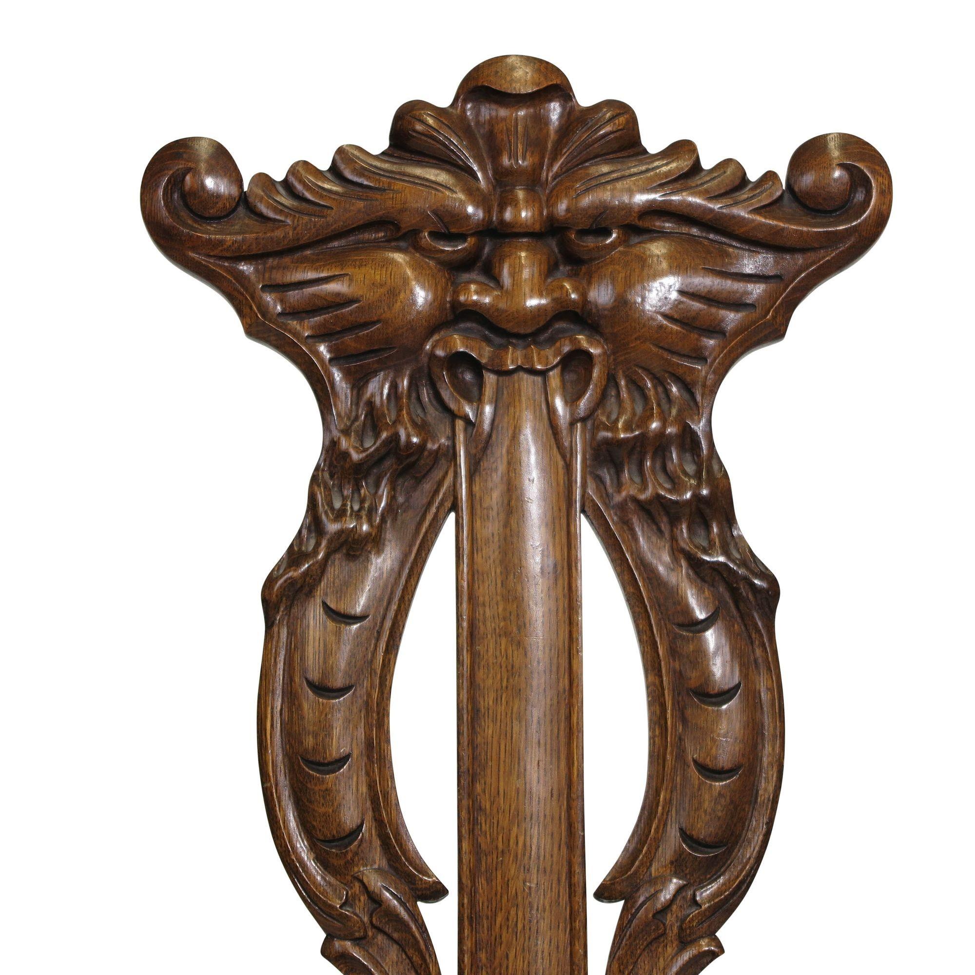 Gothic Revival 1910 Whimsically Carved Northwind Oak Chair