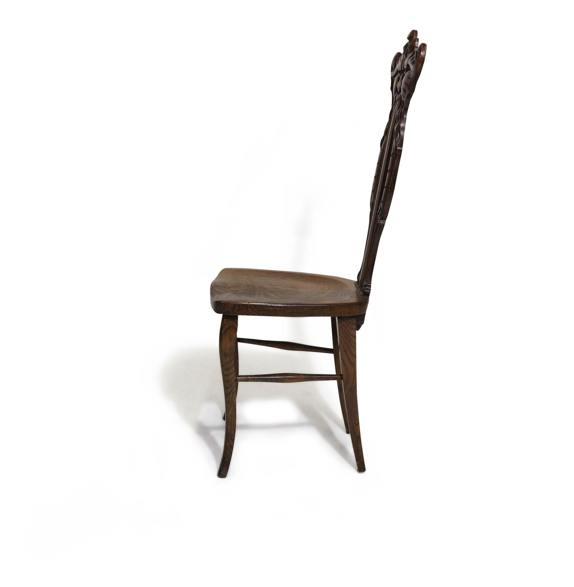 Early 20th Century 1910 Whimsically Carved Northwind Oak Chair