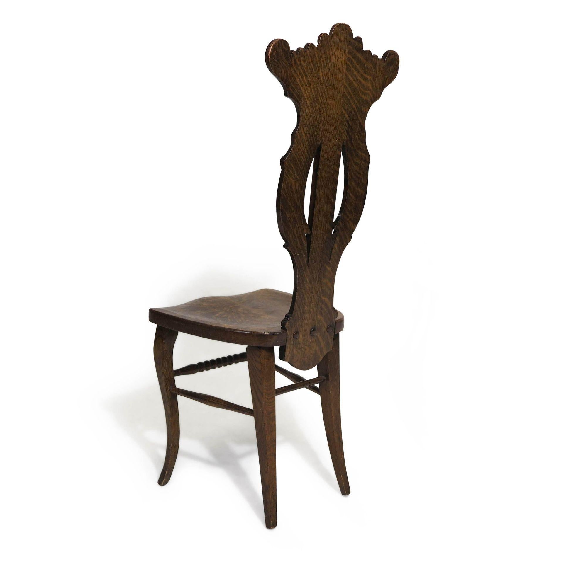 1910 Whimsically Carved Northwind Oak Chair 1