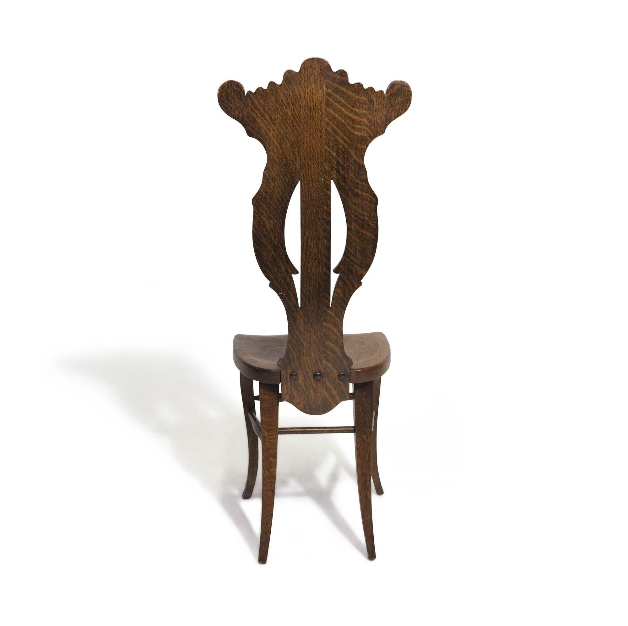 1910 Whimsically Carved Northwind Oak Chair 2