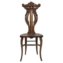 1910 Whimsically Carved Northwind Oak Chair