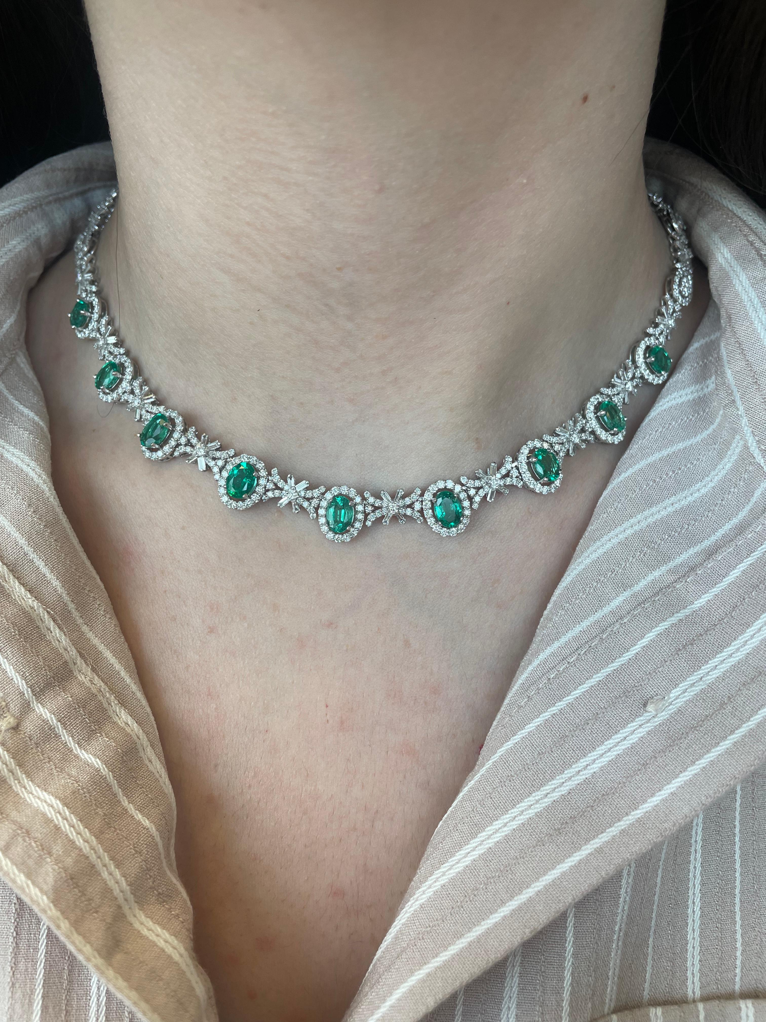 Beautiful emerald and diamond necklace. 
19.10 carats total gemstone weight. 
9 oval shaped emeralds, 6.53 carats, apx F2. 805 round and baguette cut diamonds, approximately G/H color and VS2/SI1 clarity. 18k white gold, 33.58 grams, 16.5 inches.