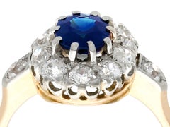 1910s 1.18 Carat Sapphire and Diamond Yellow Gold Cluster Ring