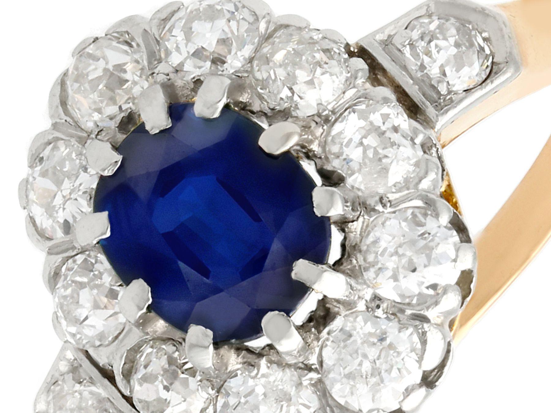 Round Cut 1910s 1.18 Carat Sapphire and Diamond Yellow Gold Cluster Ring