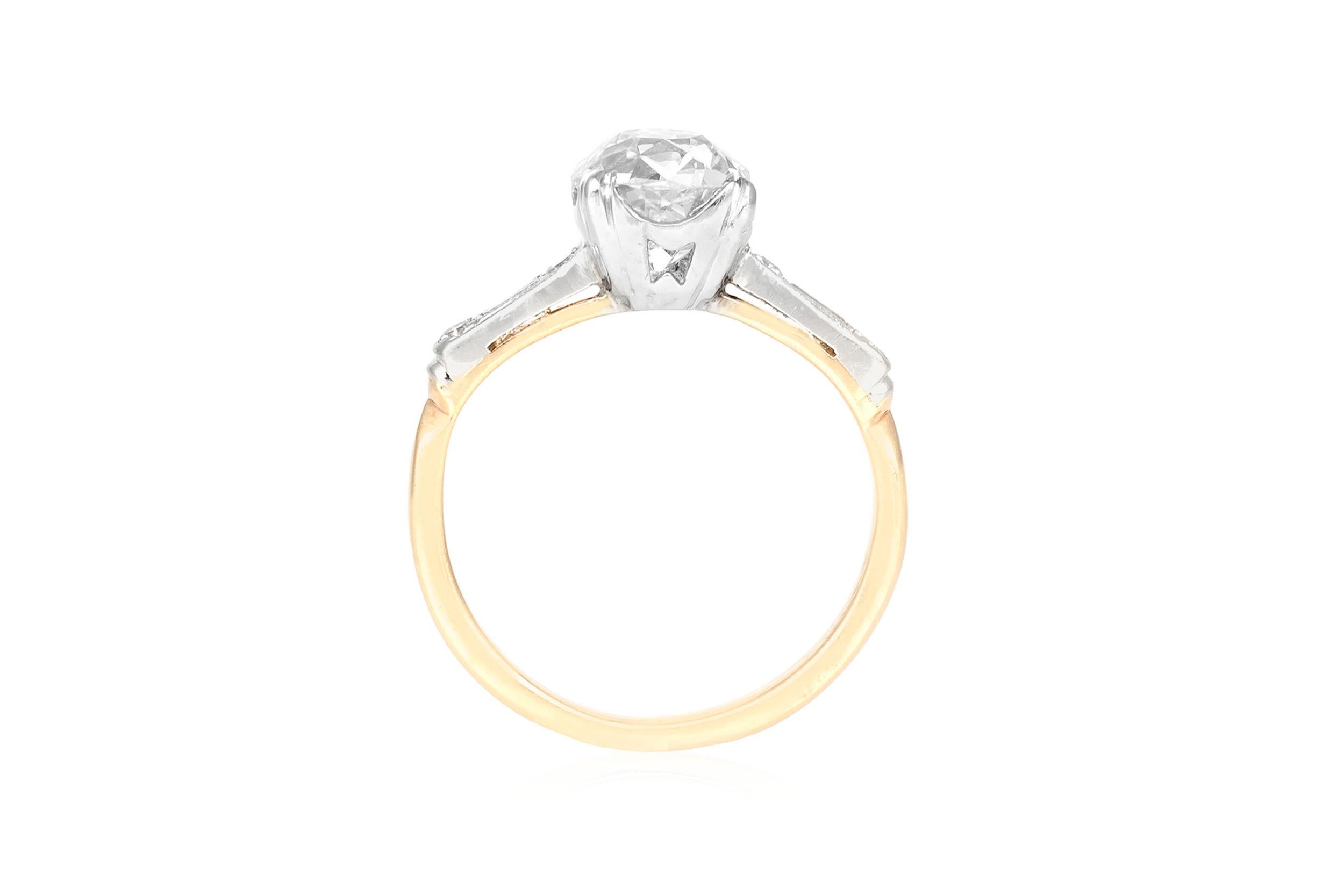 The beautiful Engagement ring is finely crafted in 14k yellow gold With round center diamond weighing approximately total of 1.67 carat.
Color J    Clarity VS1
Circa 1910