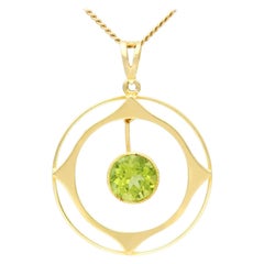 Década de 1910, Colgante de oro amarillo y peridoto de 1,83 quilates