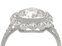 1910s 4.47 Carat Diamond and Platinum Cluster Ring