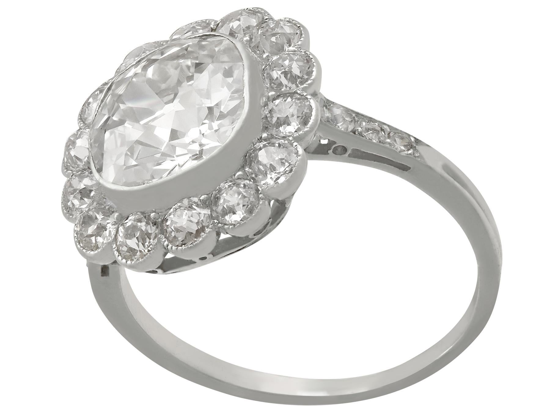 1910s 4.47 Carat Diamond and Platinum Cluster Ring 1