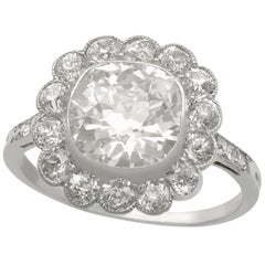 Antique 1910s 4.47 Carat Diamond and Platinum Cluster Ring