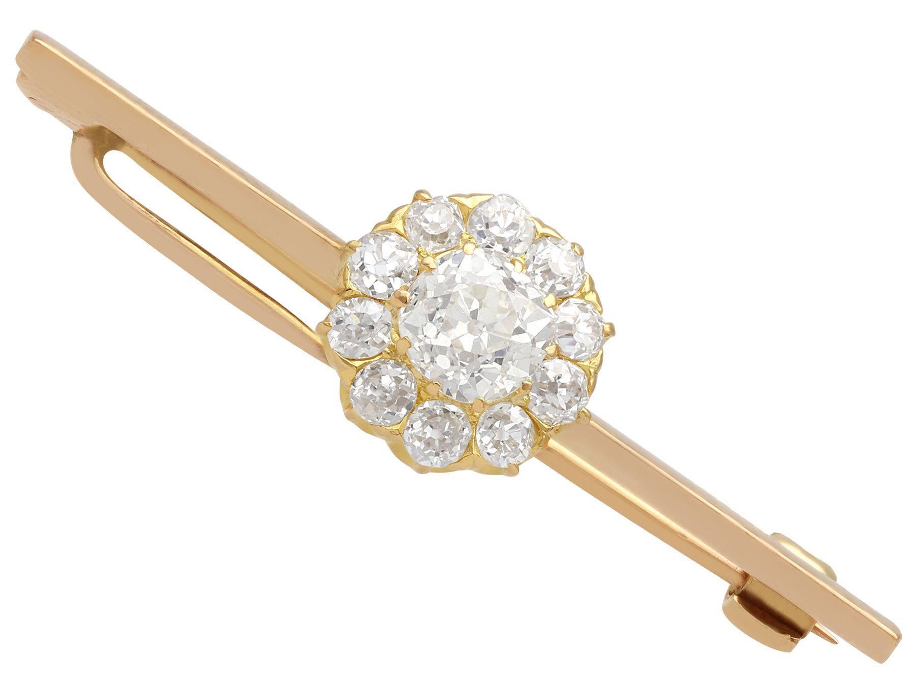 An impressive antique 1.44 carat diamond and 15 karat rose gold, 15 karat yellow gold set bar style brooch; part of our diverse antique jewelry and estate jewelry collections.

This fine and impressive antique bar brooch has been crafted in 15k rose