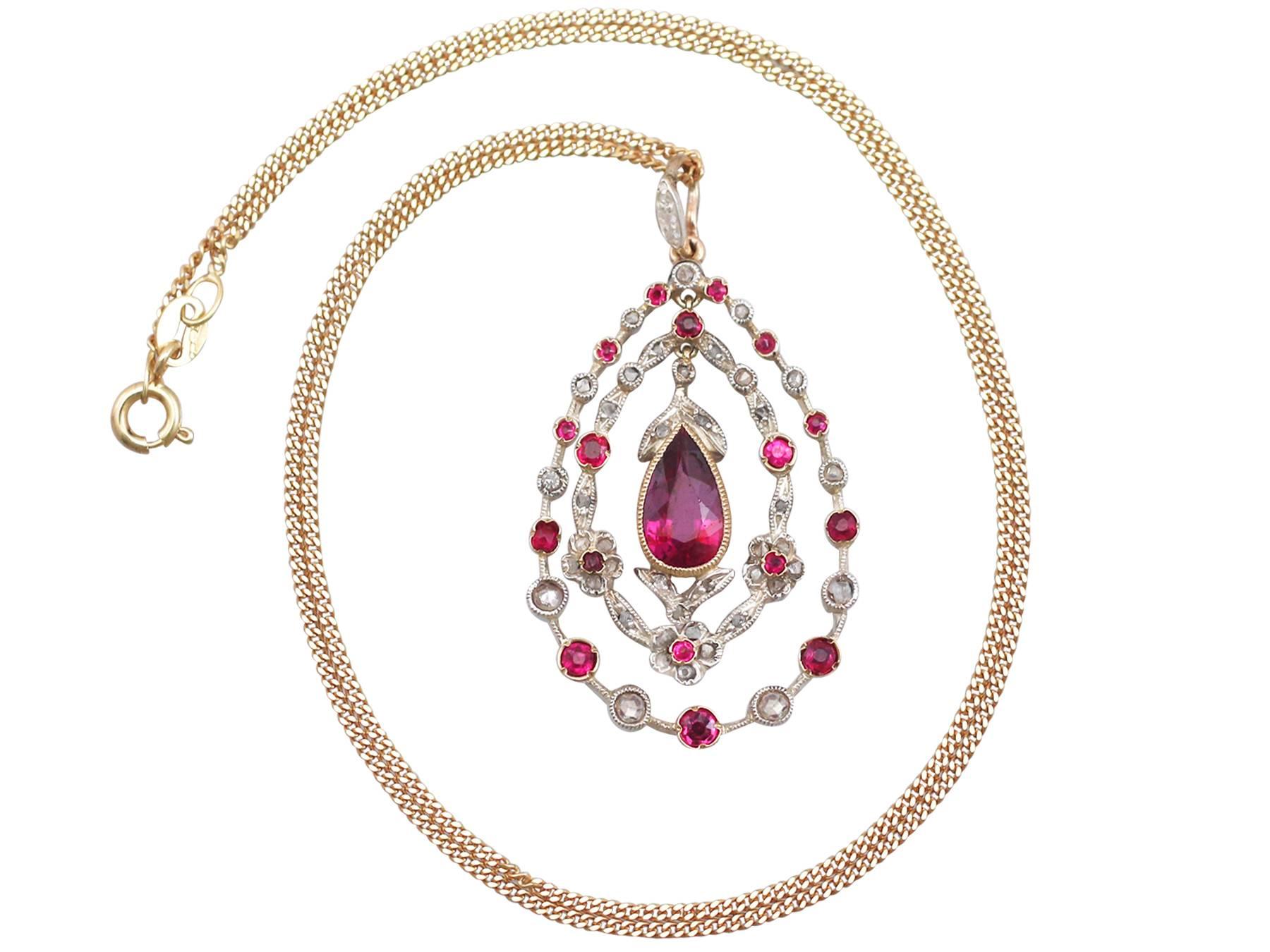 A stunning antique 1.88 Ct ruby and 0.43 Ct diamond, 15k yellow gold and silver set pendant; part of our diverse antique jewelry and estate jewelry collections.

This stunning, fine and impressive antique ruby and diamond pendant has been crafted in