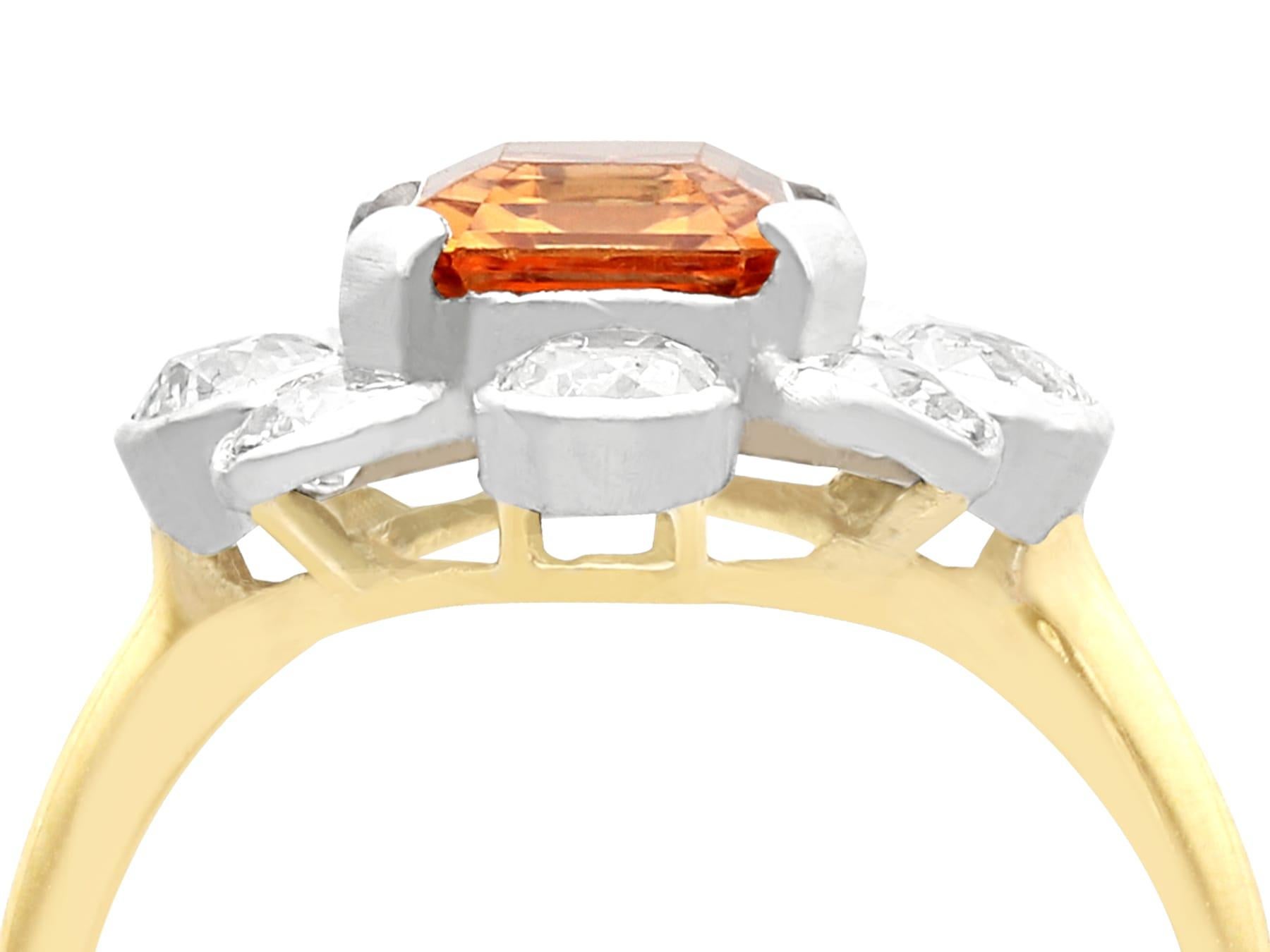 An impressive antique 2.38 carat golden topaz and 1.88 carat diamond, 18 karat gold dress ring; part of our diverse antique jewelry and estate jewelry collections.

This fine and impressive antique golden emerald cut Topaz and diamond ring has been