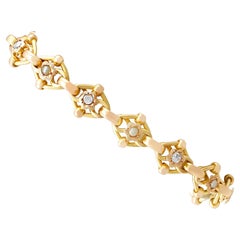 1910s 2.61 Carat Diamond and Seed Pearl Yellow Gold Bracelet