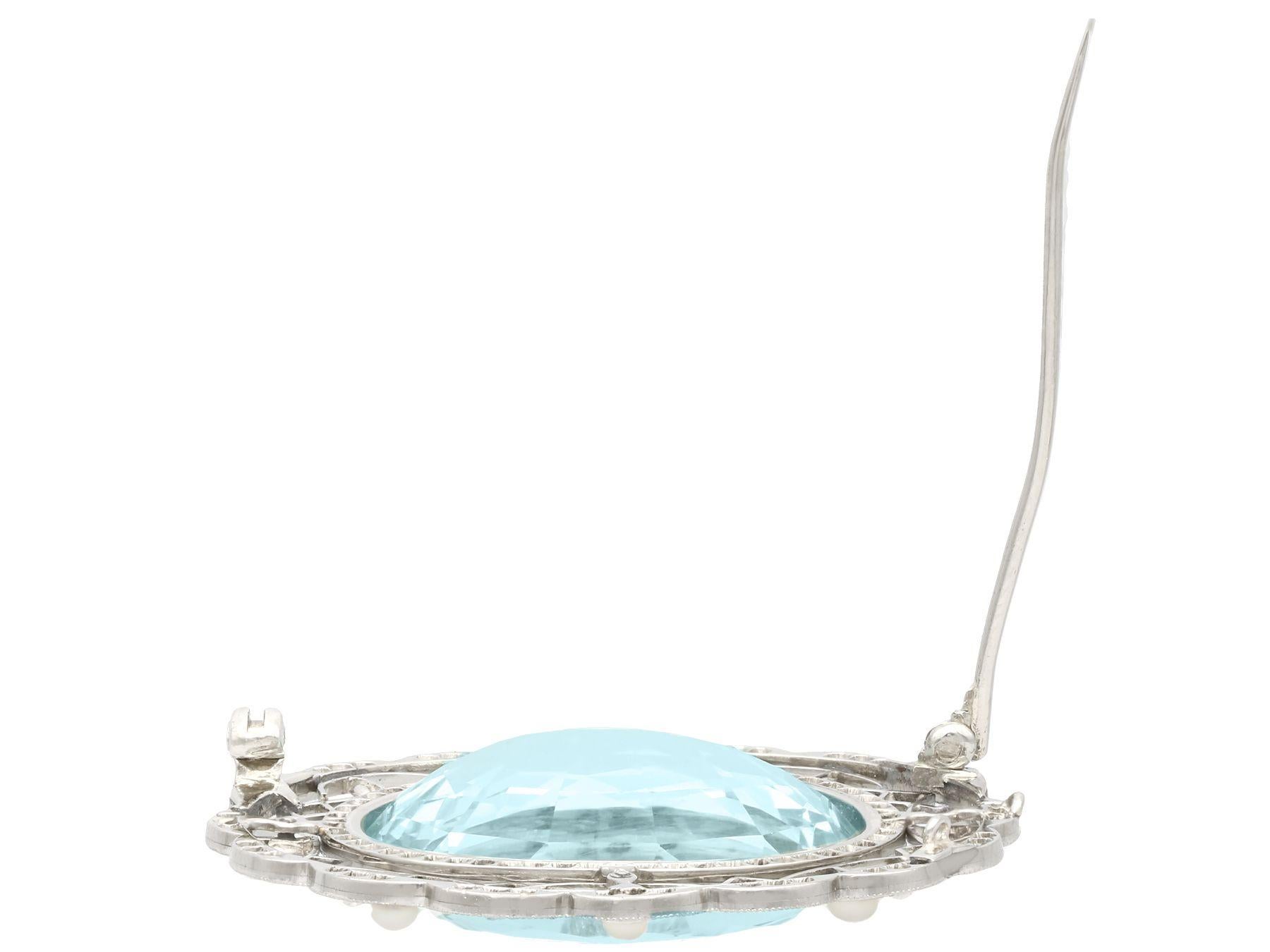 1910s, Antique 43.84 Carat Oval Cut Aquamarine Diamond and Pearl Platinum Brooch For Sale 1