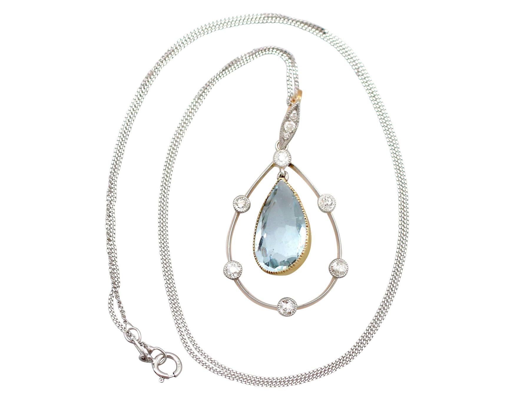An impressive antique 4.55 carat aquamarine and 0.39 carat diamond, 9 karat yellow gold and platinum set pendant; part of our diverse antique jewellery collections.

This stunning, fine and impressive aquamarine pendant has been crafted in 9k yellow