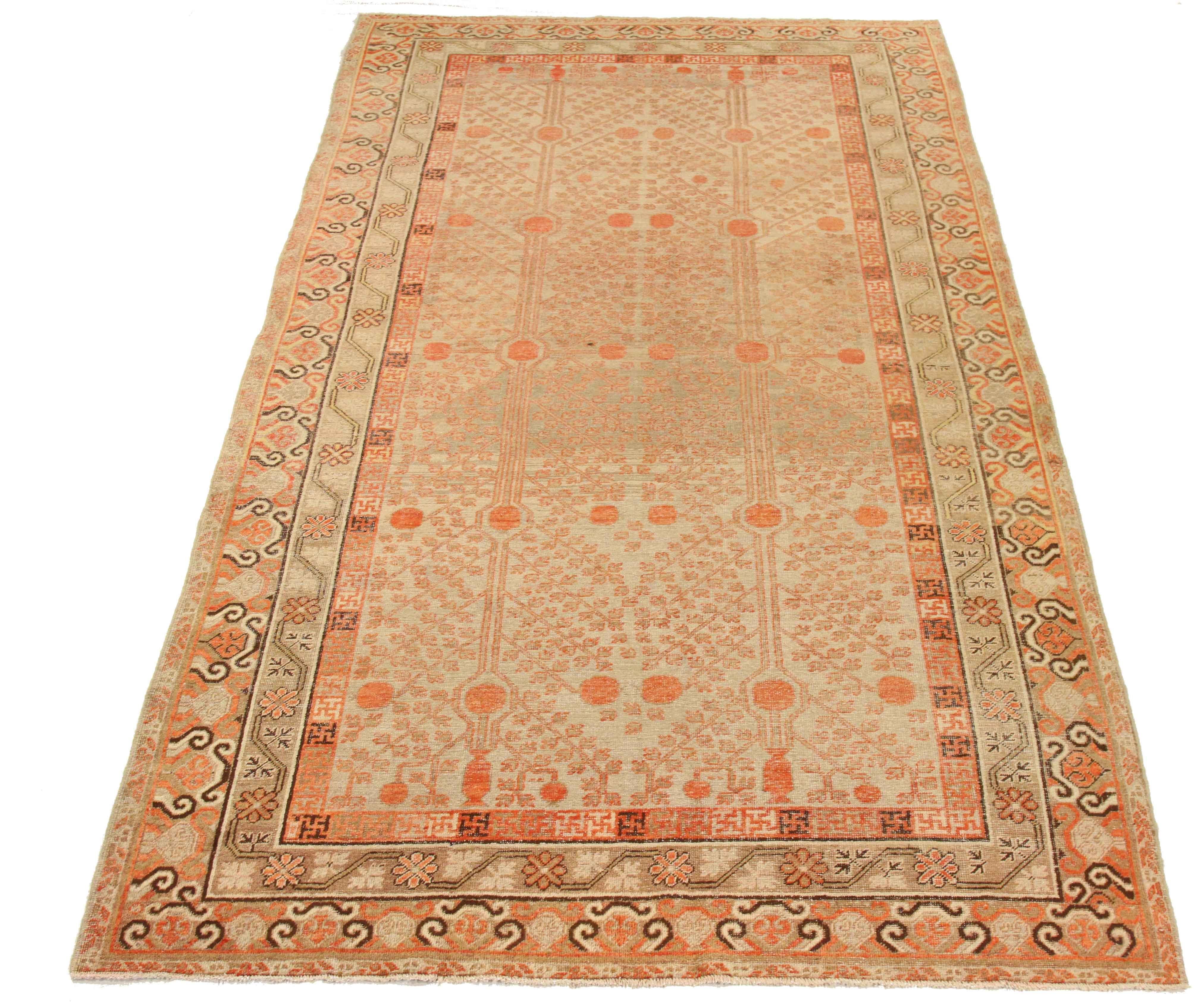 Hand-Knotted 1910s Antique Central Asian Rug Khotan Style with Rust and Beige Nature Details For Sale