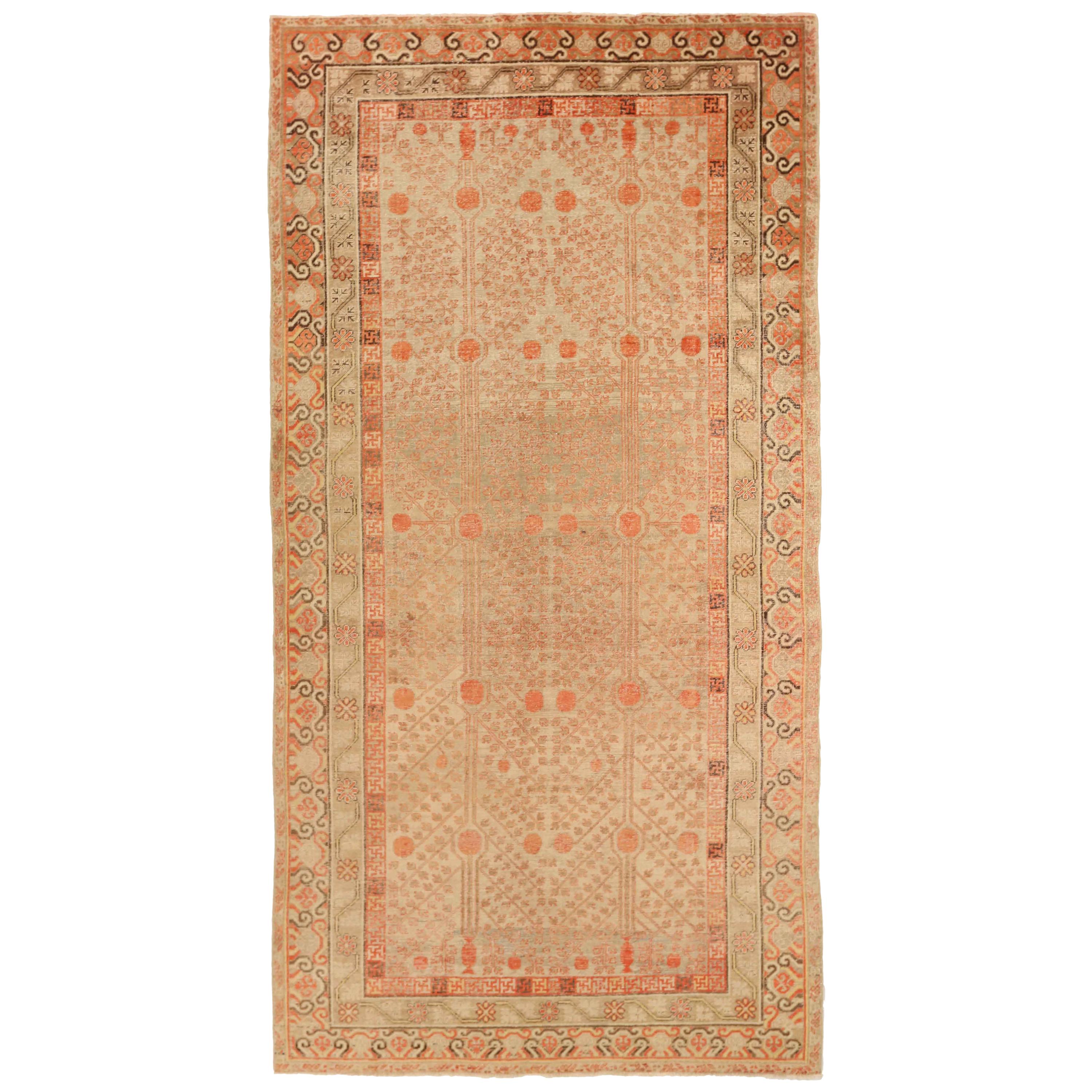 1910s Antique Central Asian Rug Khotan Style with Rust and Beige Nature Details For Sale
