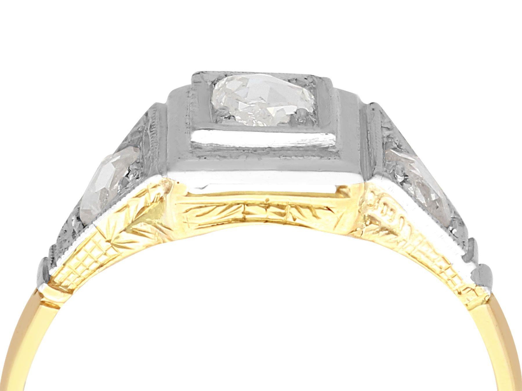 A fine and impressive antique 0.65 carat diamond and 18 karat yellow gold, 14 karat white gold set dress ring; part of our jewelry and estate jewelry collections

This fine and impressive antique diamond ring has been crafted in 18k yellow gold with