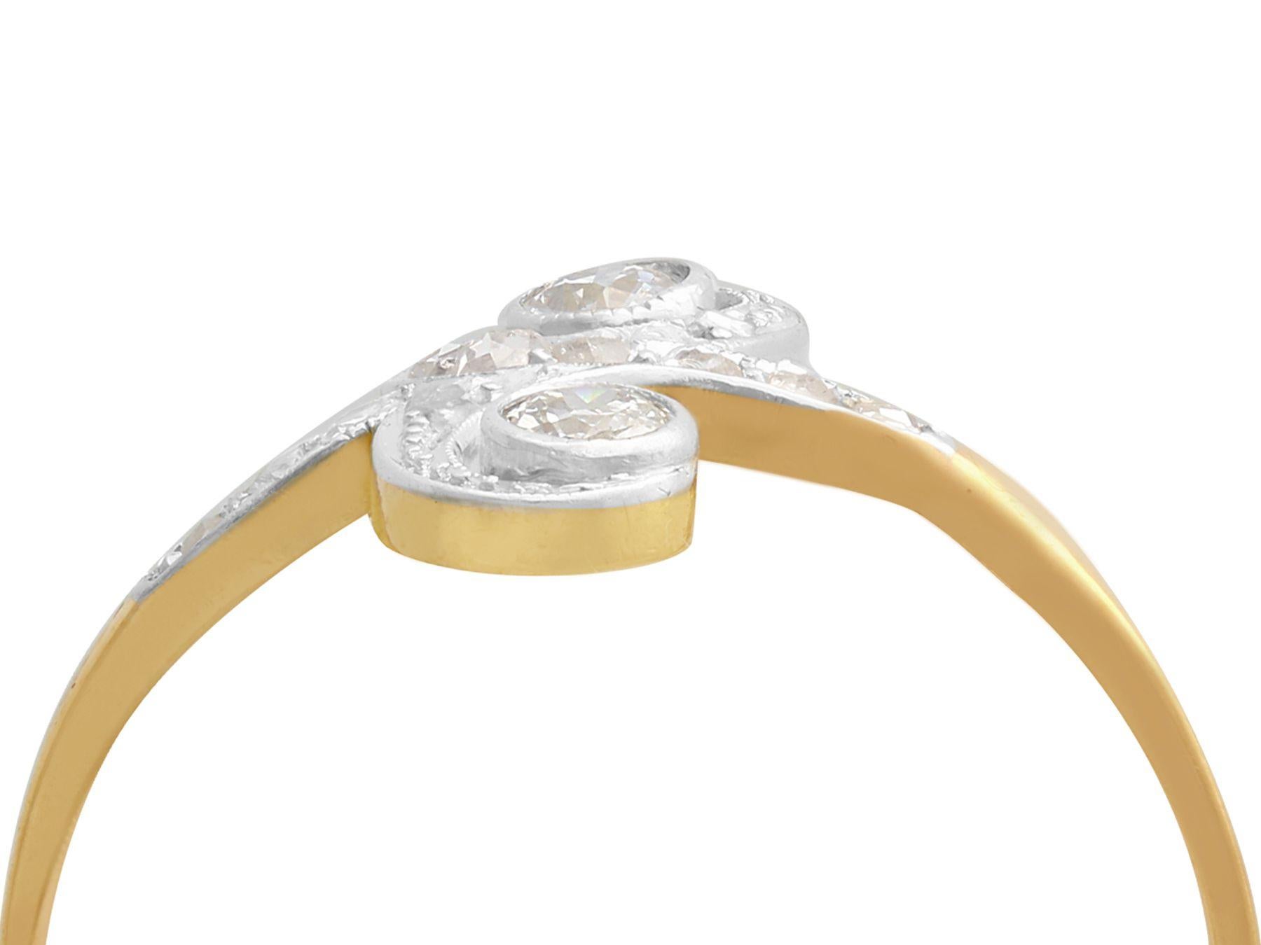 A fine and impressive 0.26 carat diamond and 18 karat yellow gold, 18 karat white gold twist style cocktail ring; part of our diverse antique jewelry and estate jewelry collections.

This fine and impressive multi diamond ring has been crafted in