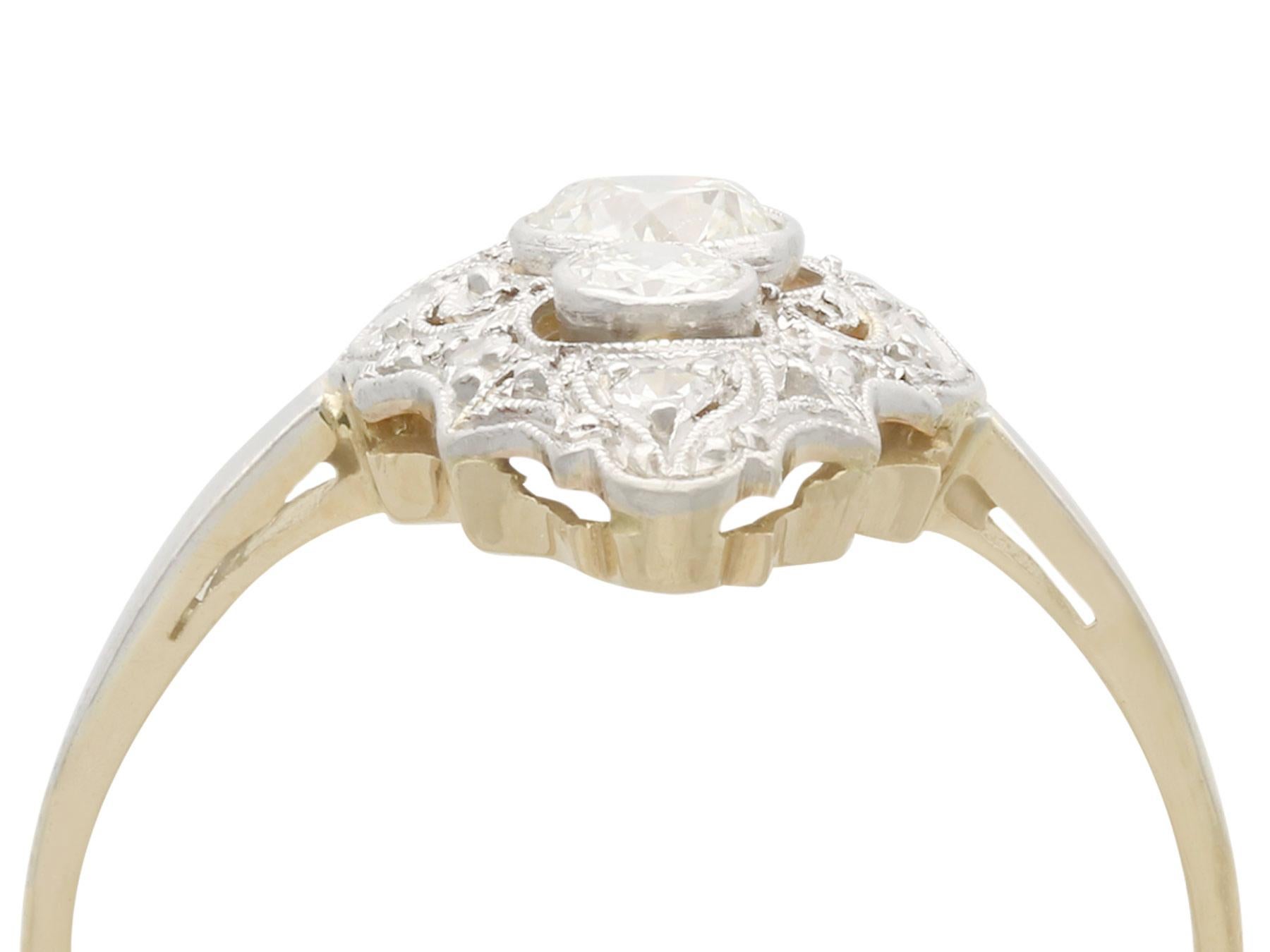 A stunning antique 0.60 carat and 18 carat yellow gold, 18 karat white gold set marquise shaped dress ring; part of our diverse antique jewelry collections.

This stunning, fine and impressive marquise shaped dress ring has been crafted in 18k