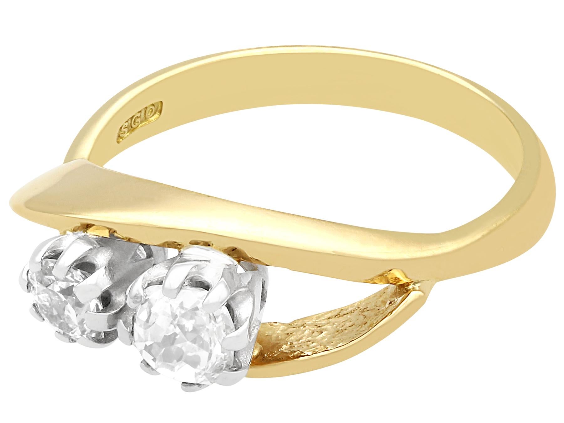 1910er Jahre Cocktailring aus Gelbgold mit zwei Steinen und Diamanten (Rundschliff) im Angebot