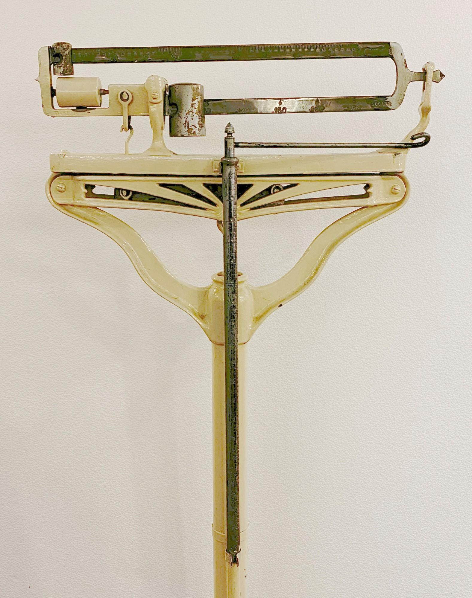 1910s antique Industrial stand up doctors' scale. Features height indicator and a movable weights with great old paint. Please note, this item is located in one of our NYC locations.