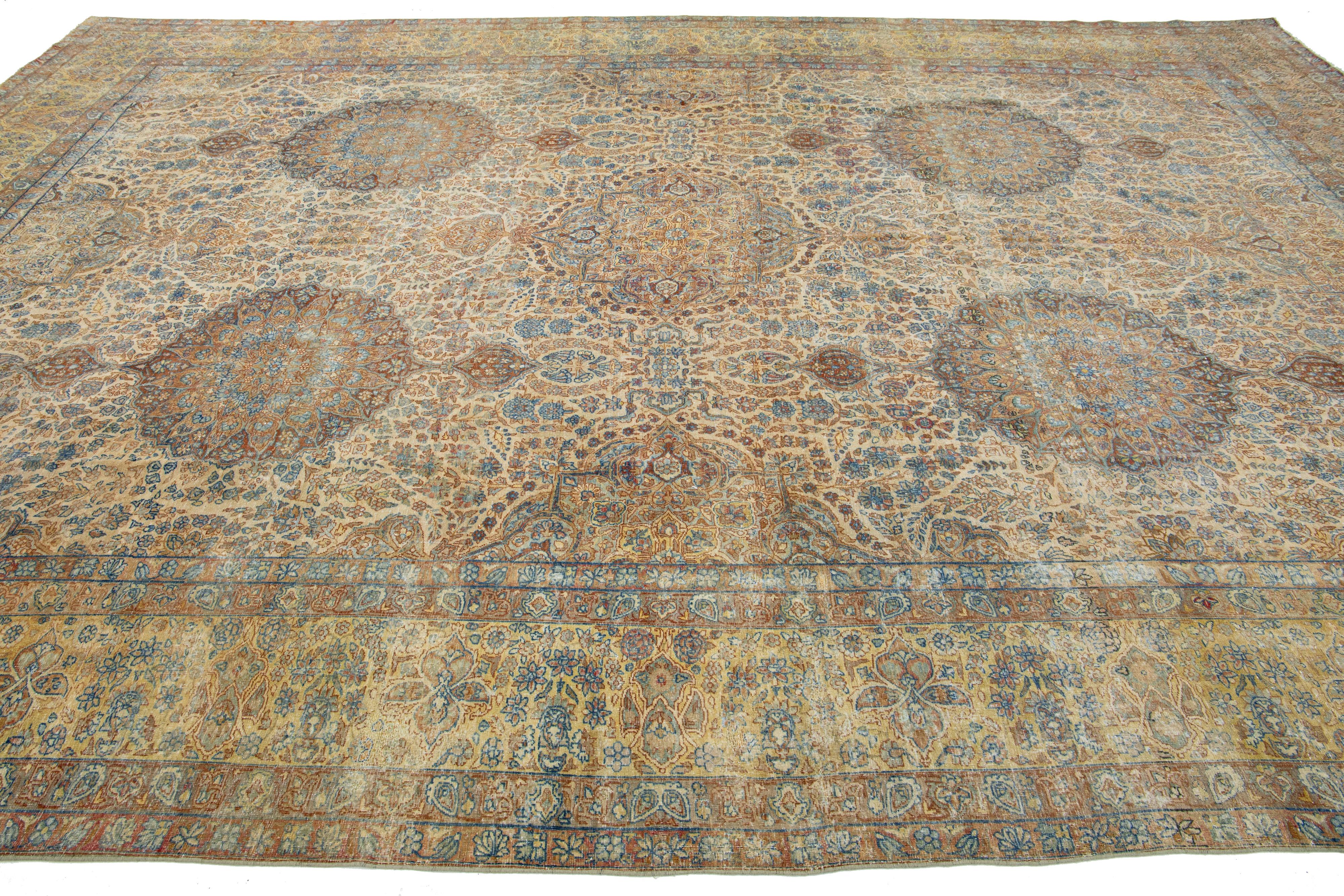 1910s Antique Kerman Persian Wool Rug with Multicolor Rosette Motif  In Good Condition For Sale In Norwalk, CT