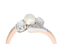 1910s Antique Pearl and Diamond Rose Gold Twist Ring