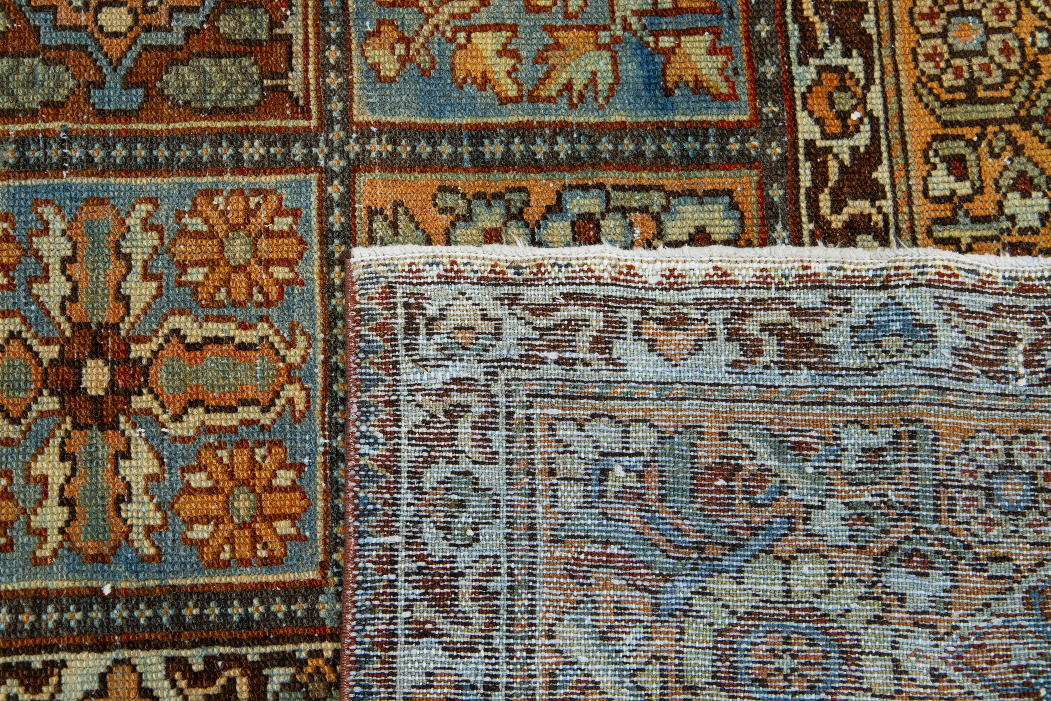1910s Antike persische Bakhtiari Wollteppich mit Allover Multicolor Motiv.  (Persisch) im Angebot
