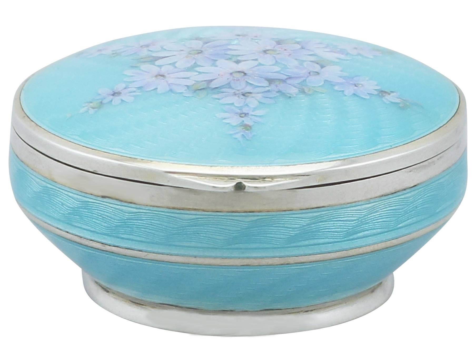 An exceptional, fine and impressive antique English sterling silver and enamel box; an addition to the ornamental silverware collection

This exceptional sterling silver and enamel antique box has a circular rounded form to a plain collet style
