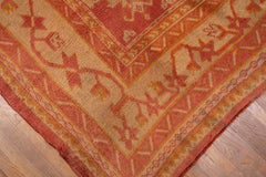 1910s Antique Turkish Oushak Area Rug, Light Red All-Over Field, Gold Borders